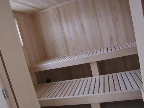 a wooden shelf in a room at Villa LipaHills in Ripanj