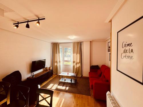 Μια τηλεόραση ή/και κέντρο ψυχαγωγίας στο Apartamento en Foz