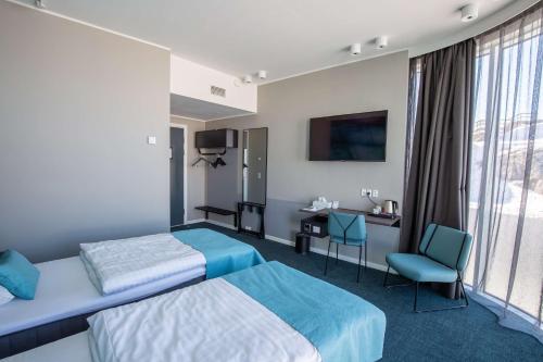 Voodi või voodid majutusasutuse Best Western Plus Hotel Ilulissat toas
