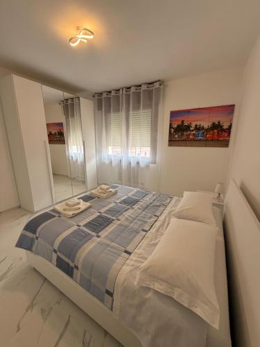 Postel nebo postele na pokoji v ubytování Residence La Pace