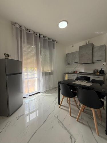 Kuchyň nebo kuchyňský kout v ubytování Residence La Pace