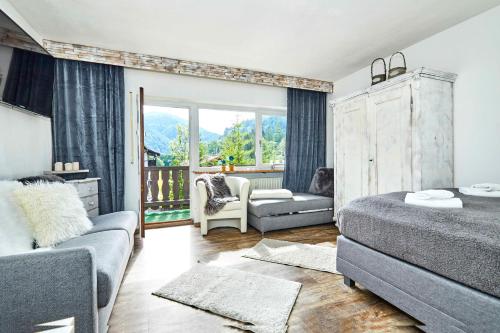 Posezení v ubytování Ferienwohnung Loferblick