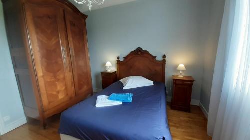Ein Bett oder Betten in einem Zimmer der Unterkunft Le gîte des Couderches