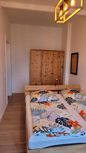 Postel nebo postele na pokoji v ubytování FW- 40 Wohnung mit großem Balkon
