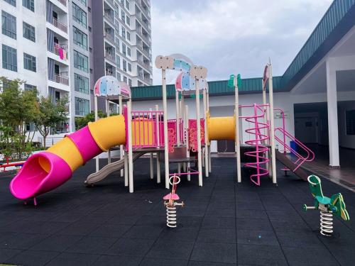 a playground with a slide on a building at BIG Two Bedrooms 1-6 Pax Luxury Condo at D Secret Garden - Johor Bahru-Setia Tropika-UTM-Mid Valley-Paradigm Mall in Johor Bahru