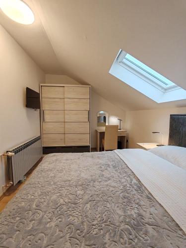Postel nebo postele na pokoji v ubytování Rooms DM - Una