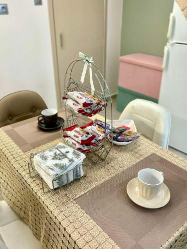 a table with a basket on top of a table at MiniLoft apartment in Volos