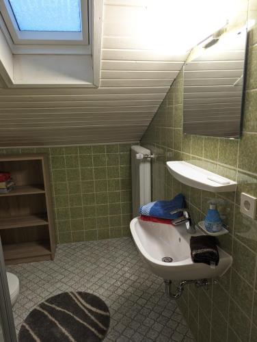 Ένα μπάνιο στο Ferienwohnung Dallinger