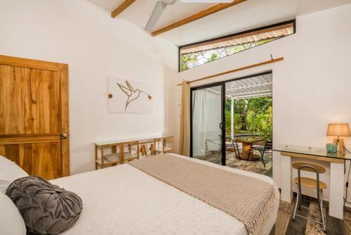 Postel nebo postele na pokoji v ubytování Casa de Valeria
