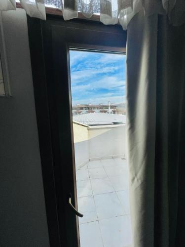 a window with a view of a roof at Ağva Manolyam Otel in Sile