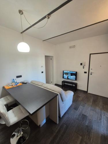 a living room with a table and a couch at 20 Minutes to FLORENCE in Prato