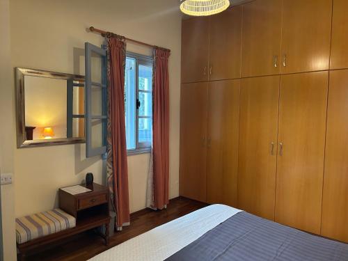 Ένα ή περισσότερα κρεβάτια σε δωμάτιο στο ANANKE Home