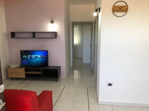 TV a/nebo společenská místnost v ubytování Casa vacanze Capo Rizzuto 3
