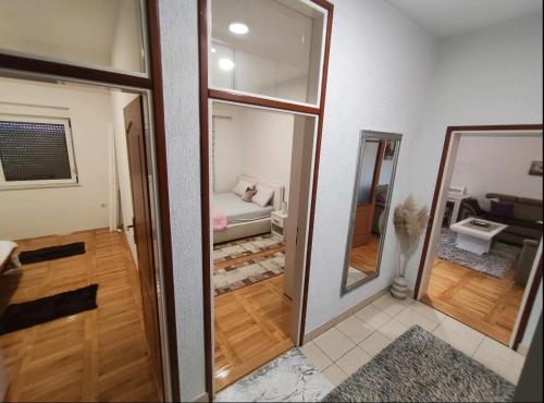 Una cama o camas en una habitación de Apartman NN Trebinje