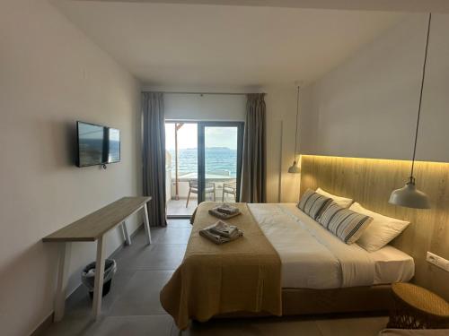 Ένα ή περισσότερα κρεβάτια σε δωμάτιο στο Anfi Suites