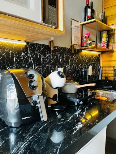 Dapur atau dapur kecil di Chalé Blessing
