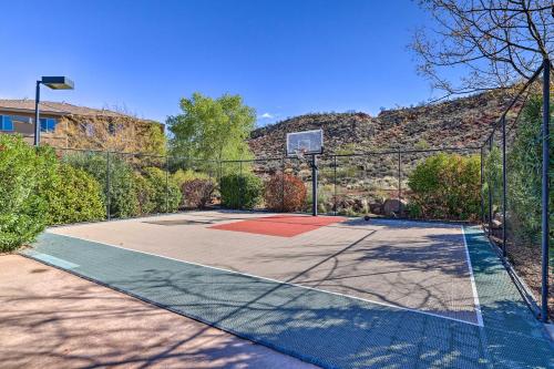 a basketball court with a basketball hoop at 25 Mi to Zion Rock n Roll Condo with Mtn View! in Hurricane