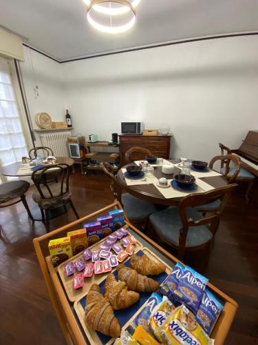a room with a table with food on it at Villa Baraggioli in Galliate