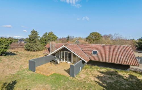 an overhead view of a house with a deck at Holiday Home Fanø 57 in Sønderho