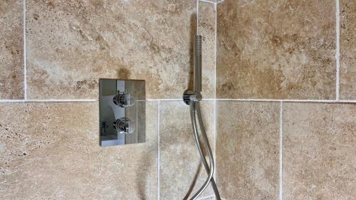 an overhead view of a shower in a bathroom at LE CHÊNE - Studio Provençal à Mougins - AC - Wifi - Parking Gratuit - in Mougins
