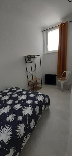 Una cama o camas en una habitación de Le Flobart