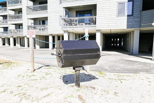 a black mailbox sitting in front of a building at Drifty Daze Oceanfront Suite w Pool in Myrtle Beach