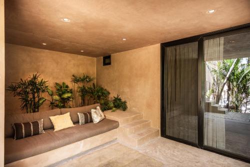 Un lugar para sentarse en Xela Tulum - Member of Design Hotels