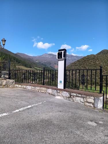 a security box sitting on the side of a fence at Hotel Finca Malvasia - Adults only in Cabezón de Liébana