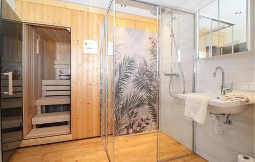 a bathroom with a shower and a sink at Ferienhaus Mit Sauna in Stadl an der Mur