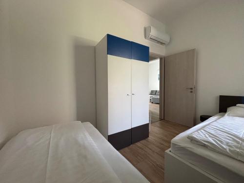 Katil atau katil-katil dalam bilik di Aranyhíd Deluxe Apartman