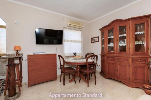 TV a/nebo společenská místnost v ubytování Casa Di Zule