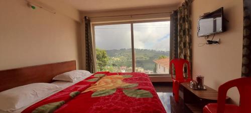 Ένα ή περισσότερα κρεβάτια σε δωμάτιο στο Happy Valley Inn