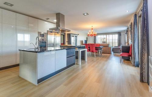 an open kitchen and living room in a house at Beautiful Home In Cox in Cox