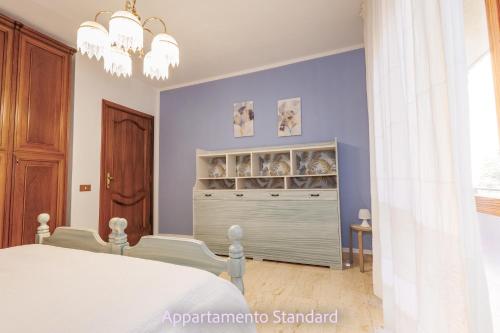Postel nebo postele na pokoji v ubytování Casa Di Zule