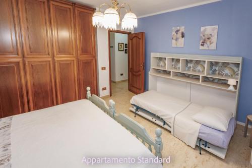 Postel nebo postele na pokoji v ubytování Casa Di Zule