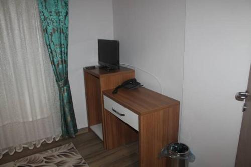 Televisyen dan/atau pusat hiburan di Ecrin Apart Otel