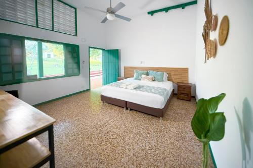 Postel nebo postele na pokoji v ubytování Hojarasca Hotel Rural