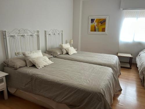 Posteľ alebo postele v izbe v ubytovaní Céntrico Apartamento en Ronda