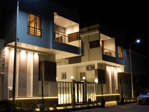 a building at night with its lights on at Bohemia palace in Hurghada