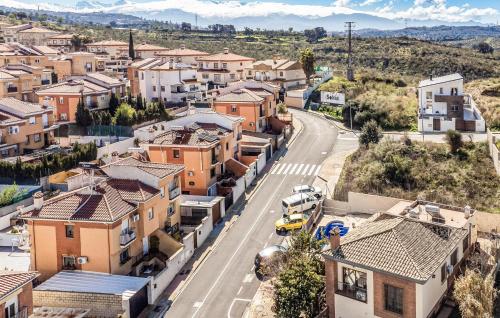 an aerial view of a town with houses and a street at Nice Home In Jun With Wifi in Jun