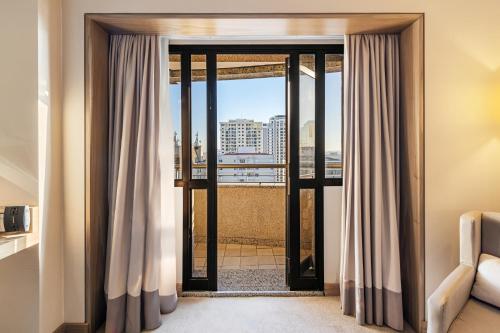 a room with a window with a view at InterContinental São Paulo by IHG in Sao Paulo