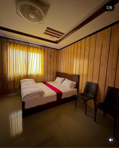Ένα ή περισσότερα κρεβάτια σε δωμάτιο στο Urban Stay
