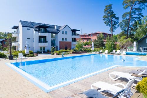 Bazén v ubytování APARTAMENTY przy plaży z basenem z podgrzewaną wodą i mini SPA - Ośrodek Kolonijno-Wczasowy Mewa nebo v jeho okolí