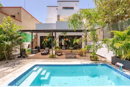 a swimming pool in the backyard of a house at Exclusive Beach Residence! with Private Pool in Playa del Carmen