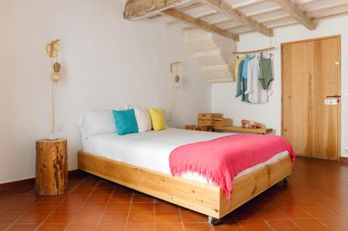 a bedroom with a bed in a room at HoMe Hotel Menorca in Ciutadella