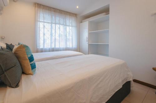 Un ou plusieurs lits dans un hébergement de l'établissement Coco Beach I&II - 6 Bedrooms , Private Pool , Beach at 200 meters