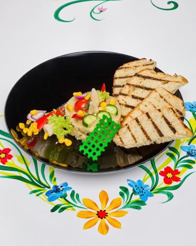 a plate of food with bread and toast at Resort EuroPark Fundata in Fundata