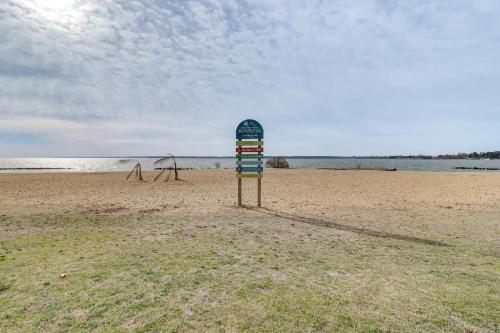 a sign in the middle of a beach at Walk to Bay Home with Fenced Yard in Colonial Beach in Colonial Beach