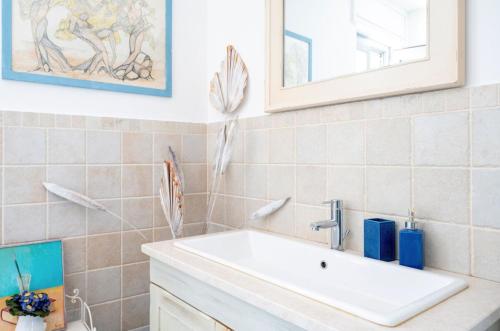 a bathroom with a sink and a mirror at Le Terrazze in Otranto