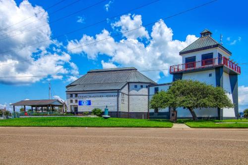 a building with a tower on the side of a road at Myrtle in Rockport